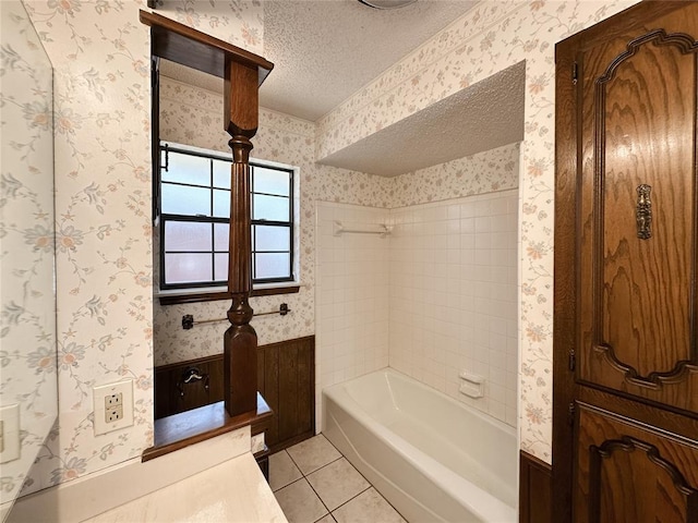 715 N Max, Hinton, OK 73047 - bathroom featuring tile patterned flooring, a textured ceiling, washtub / shower combination, and wallpapered walls