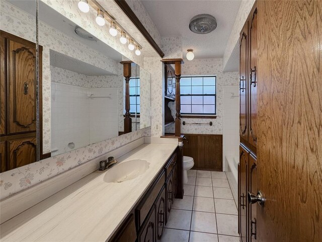 715 N Max, Hinton, OK 73047 - full bathroom with wallpapered walls, vanity, tile patterned flooring, toilet, and  shower combination