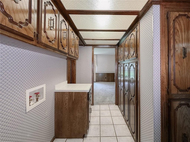 715 N Max, Hinton, OK 73047 - laundry room with cabinet space, wallpapered walls, light colored carpet, hookup for a washing machine, and light tile patterned floors