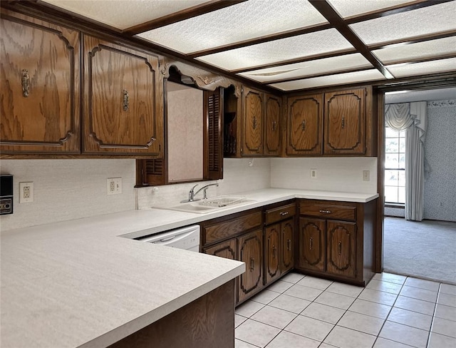 715 N Max, Hinton, OK 73047 - kitchen featuring a sink, light countertops, light tile patterned floors, and light colored carpet