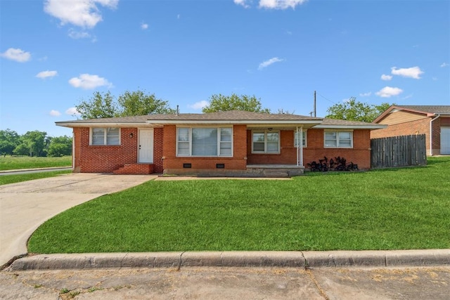 3831 NW Bell Ave, Lawton, OK 73505 - ranch-style home with brick siding, concrete driveway, and crawl space