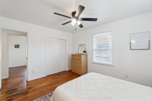 3831 NW Bell Ave, Lawton, OK 73505 - bedroom with wood finished floors, a closet, ceiling fan, and baseboards