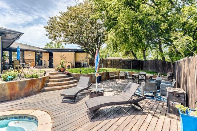 11100 Willow Grove Rd, Oklahoma City, OK 73120 - wooden terrace featuring a fenced backyard