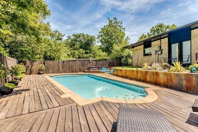 11100 Willow Grove Rd, Oklahoma City, OK 73120 - view of swimming pool with a deck and a fenced backyard