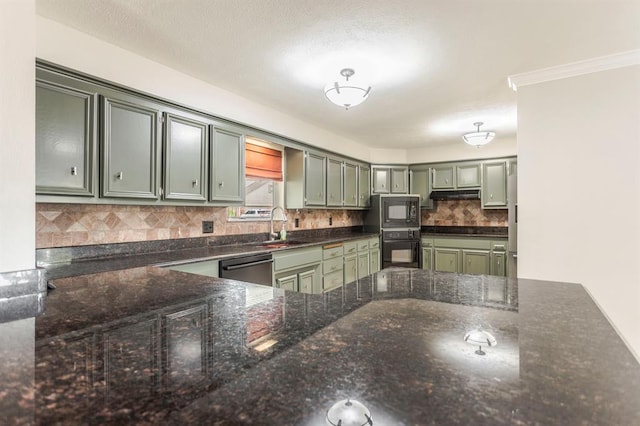 11100 Willow Grove Rd, Oklahoma City, OK 73120 - kitchen featuring black appliances, green cabinetry, decorative backsplash, dark stone counters, and under cabinet range hood