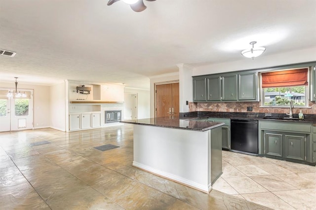 11100 Willow Grove Rd, Oklahoma City, OK 73120 - kitchen featuring dishwashing machine, tasteful backsplash, ornamental molding, dark stone counters, and open floor plan