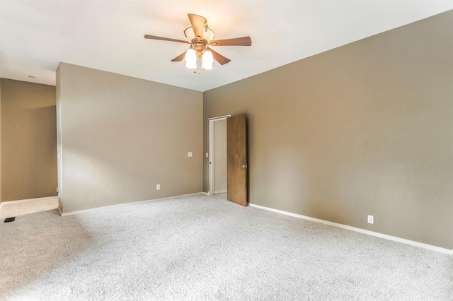 11100 Willow Grove Rd, Oklahoma City, OK 73120 - empty room with a ceiling fan and carpet floors