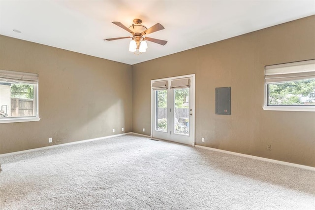 11100 Willow Grove Rd, Oklahoma City, OK 73120 - spare room featuring electric panel, carpet, and a ceiling fan