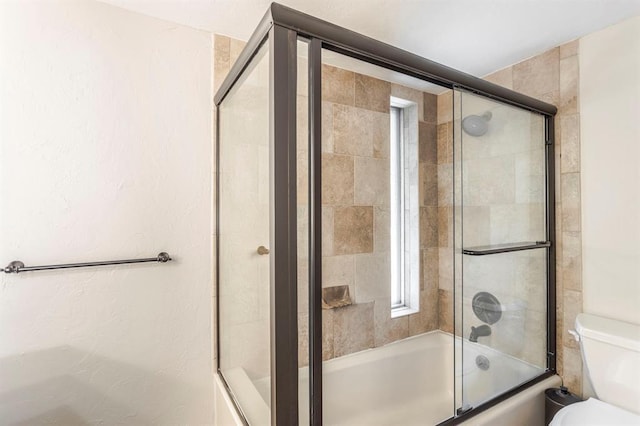 11100 Willow Grove Rd, Oklahoma City, OK 73120 - bathroom featuring toilet and combined bath / shower with glass door