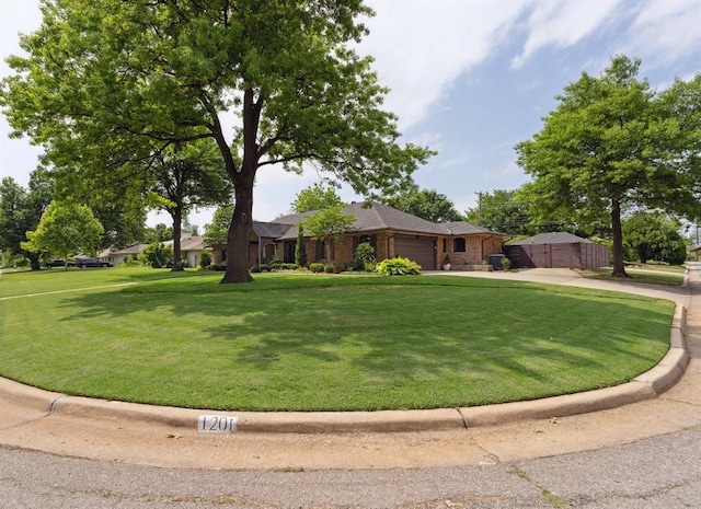 1201 Westchester Dr, Oklahoma City, OK 73114 - ranch-style house with a garage, driveway, and brick siding