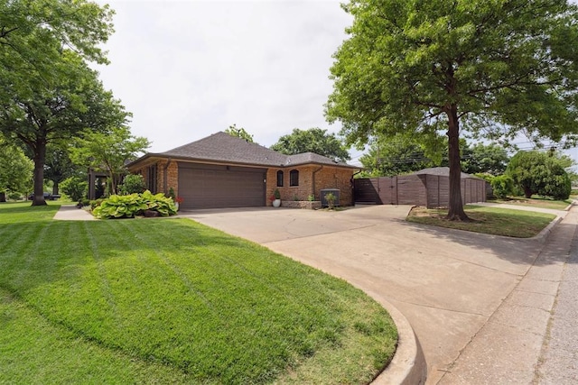 1201 Westchester Dr, Oklahoma City, OK 73114 - single story home with driveway, a garage, brick siding, and a gate