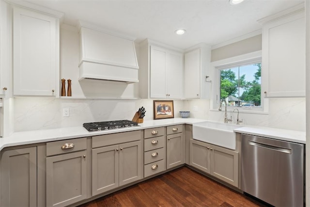 1201 Westchester Dr, Oklahoma City, OK 73114 - kitchen featuring appliances with stainless steel finishes, a sink, custom range hood, gray cabinetry, and recessed lighting