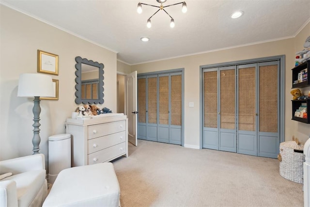 1201 Westchester Dr, Oklahoma City, OK 73114 - bedroom featuring carpet floors, crown molding, two closets, and recessed lighting