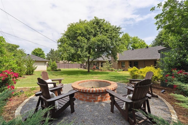 1201 Westchester Dr, Oklahoma City, OK 73114 - view of patio featuring a fire pit