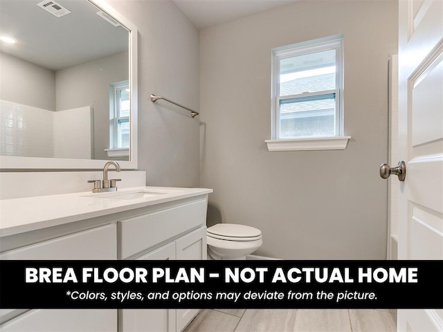 1100 Redwood Creek Dr, Yukon, OK 73099 - bathroom featuring toilet, vanity, and a shower