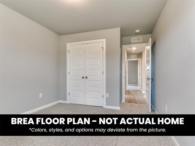 1100 Redwood Creek Dr, Yukon, OK 73099 - unfurnished bedroom featuring a closet, light colored carpet, and baseboards