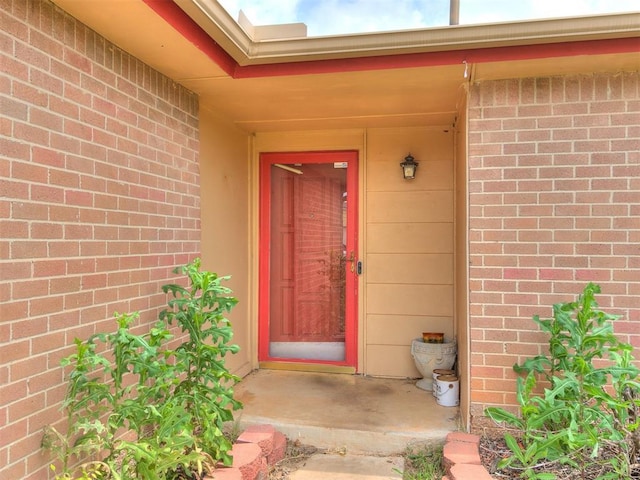 216 N English Dr, Moore, OK 73160 - entrance to property featuring brick siding