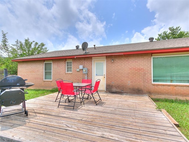 216 N English Dr, Moore, OK 73160 - deck with outdoor dining space and a grill