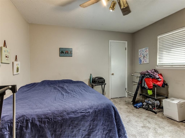 2904 N Shannon Ave, Bethany, OK 73008 - carpeted bedroom with a ceiling fan