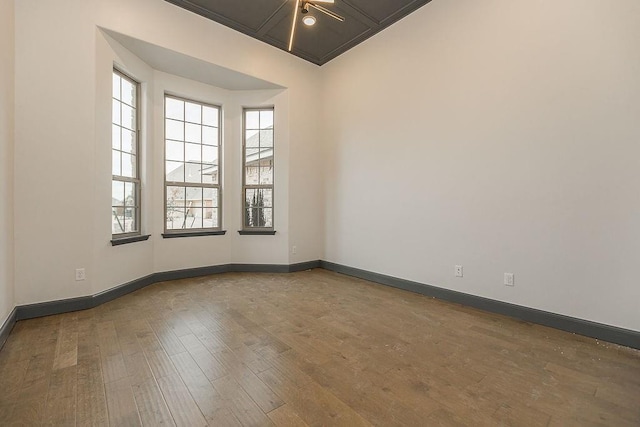 9120 SW 34th St, Oklahoma City, OK 73179 - unfurnished room with hardwood / wood-style flooring and baseboards