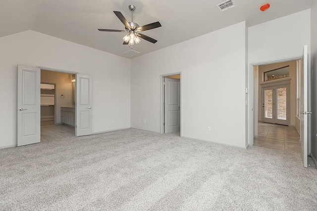 9120 SW 34th St, Oklahoma City, OK 73179 - unfurnished bedroom with light carpet, lofted ceiling, baseboards, and ceiling fan