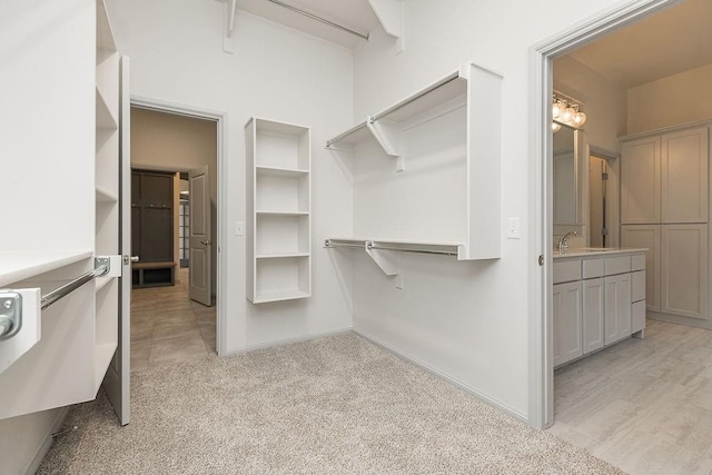 9120 SW 34th St, Oklahoma City, OK 73179 - walk in closet featuring a sink