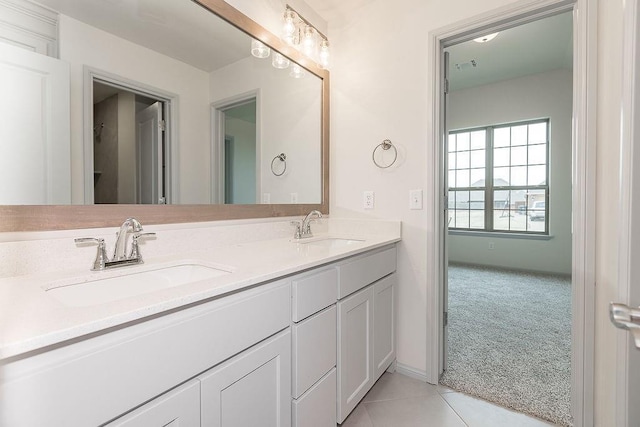 9120 SW 34th St, Oklahoma City, OK 73179 - bathroom featuring double vanity and tile patterned floors