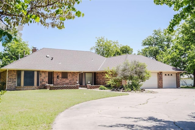 5624 N Mueller Ave, Bethany, OK 73008 - single story home featuring an attached garage, concrete driveway, brick siding, a front lawn, and a chimney