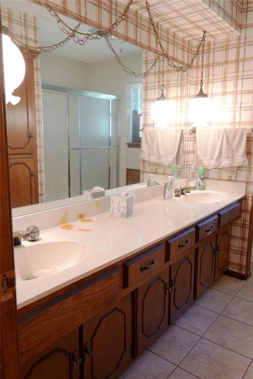 5624 N Mueller Ave, Bethany, OK 73008 - full bath featuring double vanity, wallpapered walls, tile patterned flooring, and a stall shower