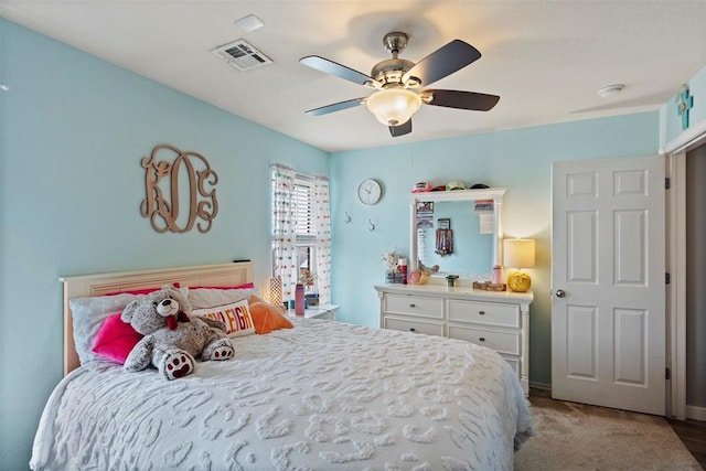 4125 Queens Dr, Moore, OK 73160 - bedroom with ceiling fan and carpet flooring