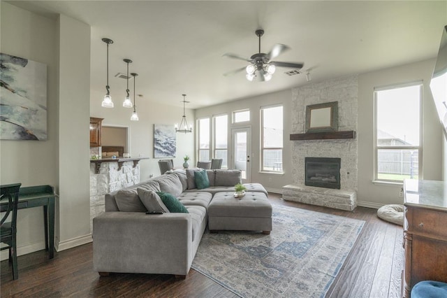 2504 NW 180th St, Edmond, OK 73012 - living room with a ceiling fan, plenty of natural light, and dark wood-style flooring