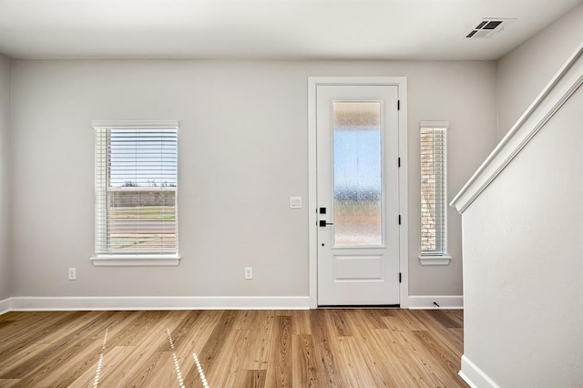 11904 SW 30th St, Yukon, OK 73099 - entryway with light wood finished floors and baseboards