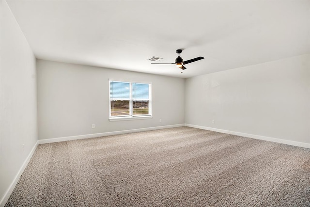 11904 SW 30th St, Yukon, OK 73099 - spare room with ceiling fan, carpet, and baseboards