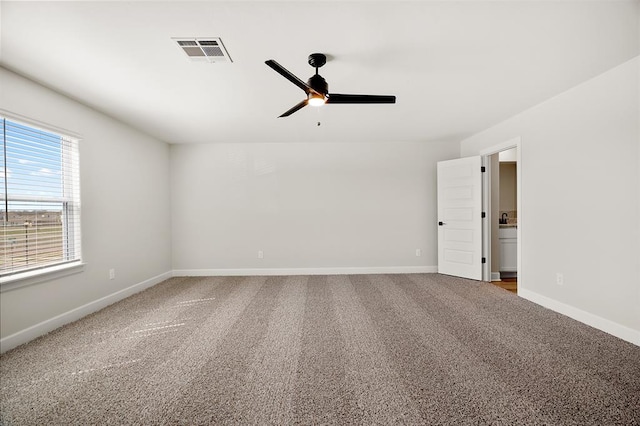 11904 SW 30th St, Yukon, OK 73099 - unfurnished room with a ceiling fan, carpet, and baseboards