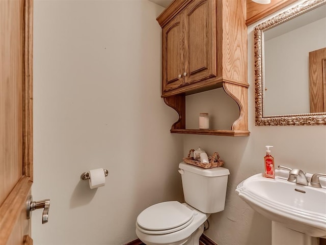 1017 SW 107th St, Oklahoma City, OK 73170 - bathroom featuring a sink and toilet