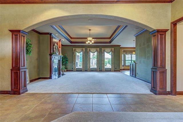 12509 St Lukes Ln, Oklahoma City, OK 73142 - foyer entrance featuring carpet flooring, arched walkways, crown molding, baseboards, and a textured wall