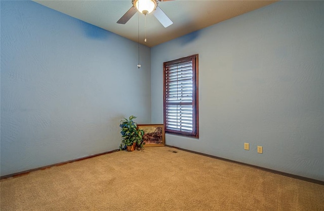 12509 St Lukes Ln, Oklahoma City, OK 73142 - spare room featuring carpet floors, ceiling fan, and baseboards