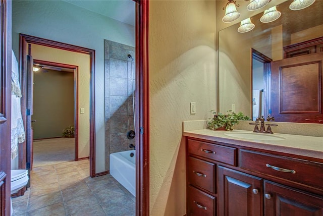 12509 St Lukes Ln, Oklahoma City, OK 73142 - full bath with vanity, a textured wall, shower / bath combination, baseboards, and toilet