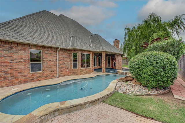 12509 St Lukes Ln, Oklahoma City, OK 73142 - view of swimming pool featuring a fenced backyard, a patio, and a pool with connected hot tub