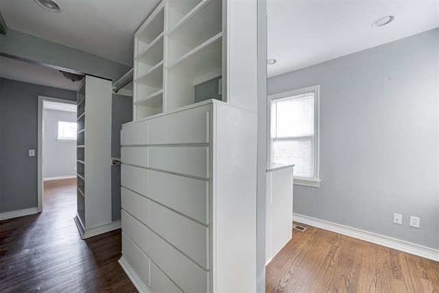 2109 Brighton Ave, Oklahoma City, OK 73120 - spacious closet featuring wood finished floors