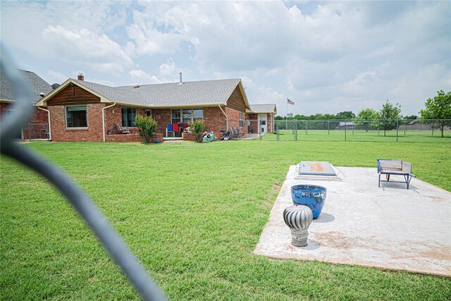 8100 N Burns Rd, Edmond, OK 73025 - back of property with brick siding, a shingled roof, and a chimney