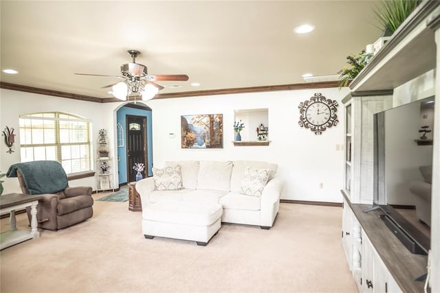 8100 N Burns Rd, Edmond, OK 73025 - living area featuring light carpet, a ceiling fan, crown molding, recessed lighting, and baseboards