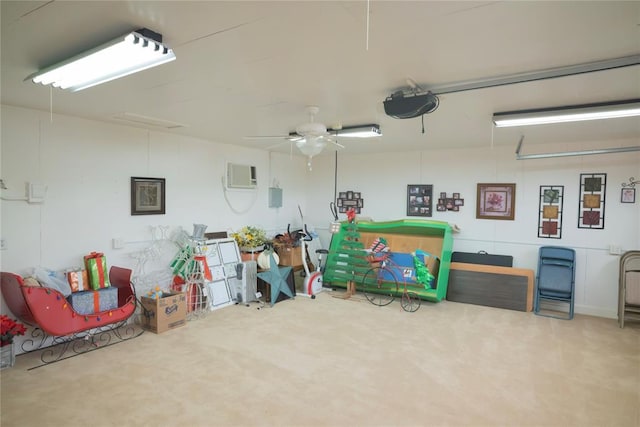 8100 N Burns Rd, Edmond, OK 73025 - garage featuring an AC wall unit, a garage door opener, and ceiling fan
