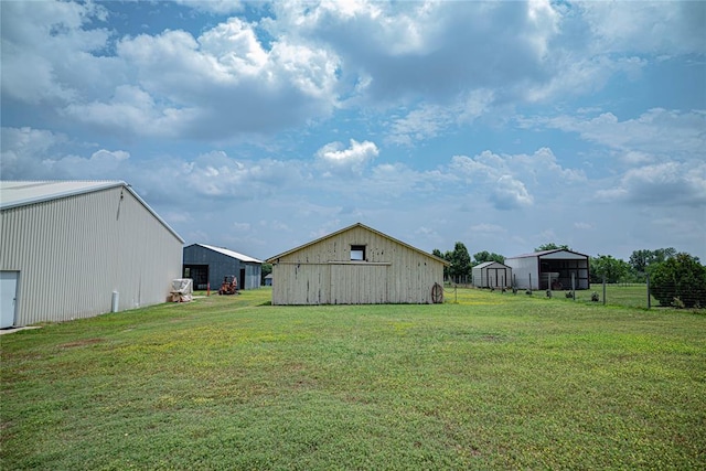 8100 N Burns Rd, Edmond, OK 73025 - view of green lawn featuring an outbuilding