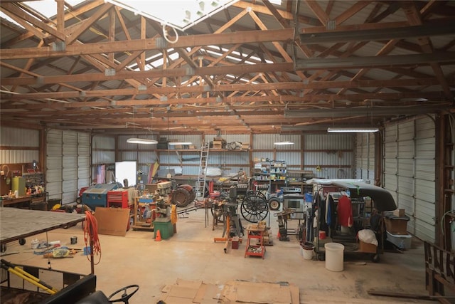 8100 N Burns Rd, Edmond, OK 73025 - garage featuring a workshop area and metal wall