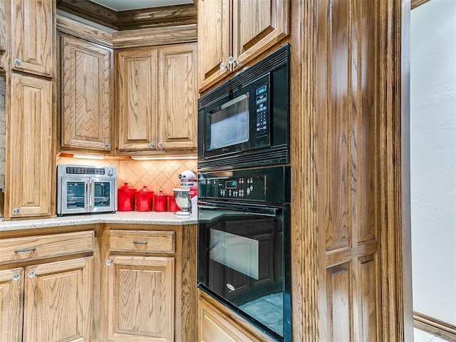 5877 W Washington Ave, Piedmont, OK 73078 - kitchen featuring black appliances, decorative backsplash, and light countertops
