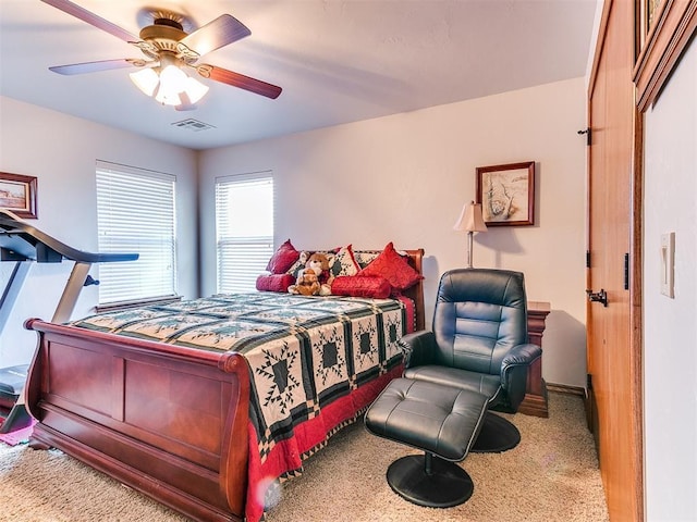 5877 W Washington Ave, Piedmont, OK 73078 - carpeted bedroom featuring ceiling fan and baseboards