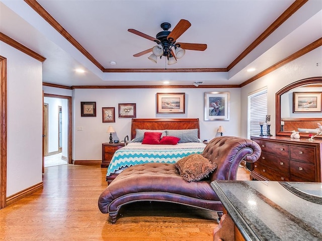 5877 W Washington Ave, Piedmont, OK 73078 - bedroom with a tray ceiling, wood finished floors, crown molding, recessed lighting, and baseboards