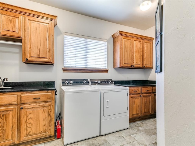 5877 W Washington Ave, Piedmont, OK 73078 - laundry room with cabinet space and washer and clothes dryer