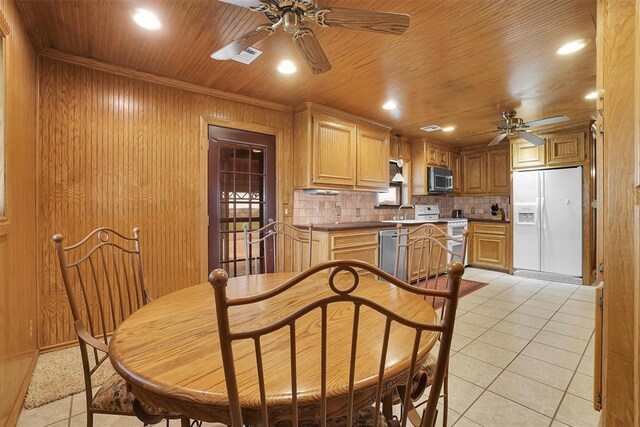 20523 E County Road 158th Rd, Altus, OK 73521 - dining area featuring ceiling fan, light tile patterned floors, wooden walls, recessed lighting, and wood ceiling